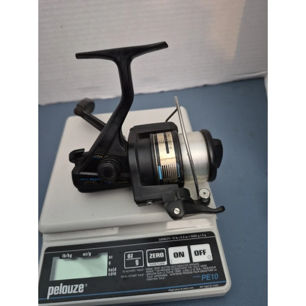 Daiwa  AG1305X LONG CAST SPOOL X‎ FISHING REEL SPINNING REEL W AUTOCAST VGUC